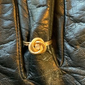 Gold color swirly ring with faux diamond